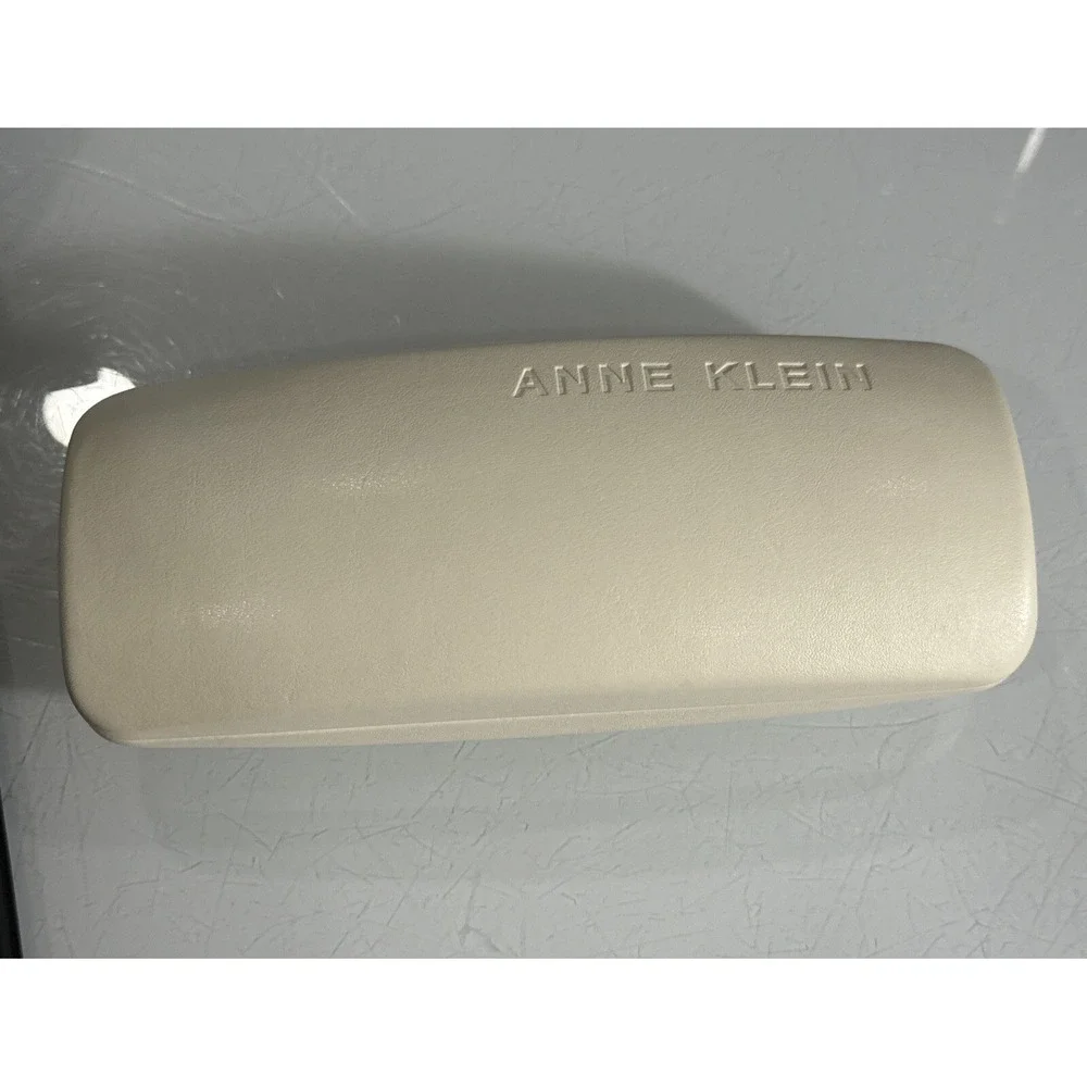 Anne Klein off white hard eyeglass clamshell case with logo